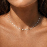 Biały choker z koralikami